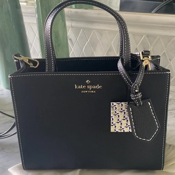 Kate spade black purse with white stitching best sale